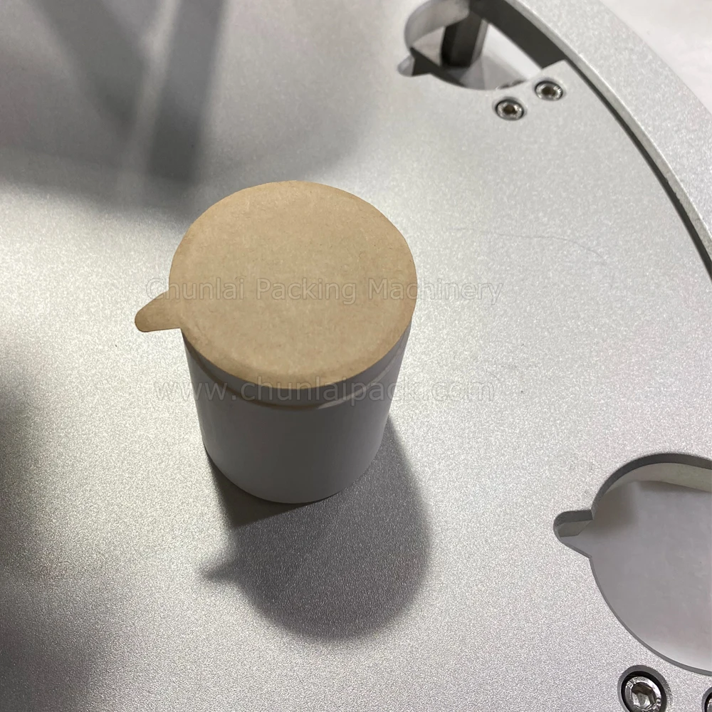 Full Automatic Potato Chips Can Top Cover Sealing Packaging Machine