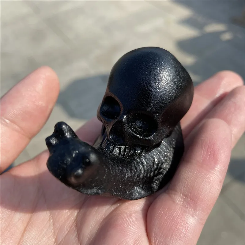 
Hot Sale Natural Healing Function Hand Carved Crystal Black Obsidian Snail Skulls For Home Decoration 