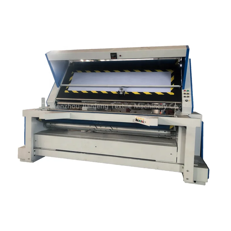 Textile fabric rewinding inspection machine