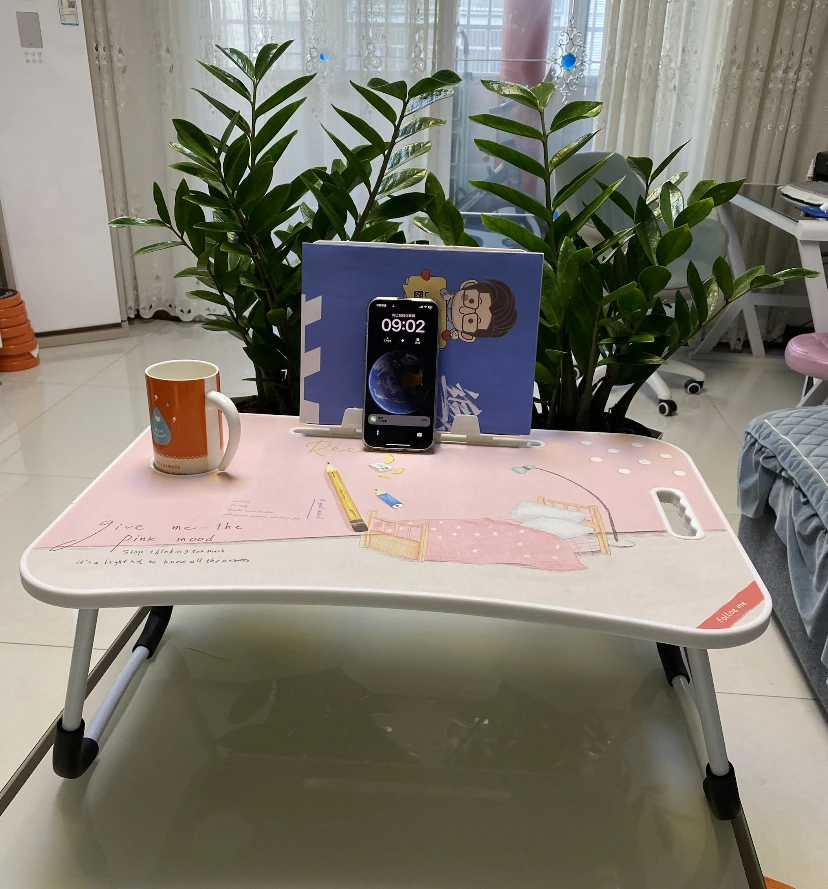 Portable and adjustable Mac laptop bed stand desk laptop desk suitable for home work travel and comes with a cup holder