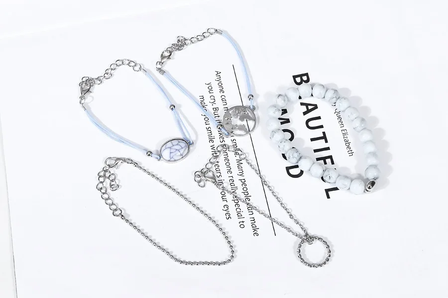 
Korean Fashion Oval crack pine stone bead chain map hollow ring bracelet set of five pieces creative marble hand rope 