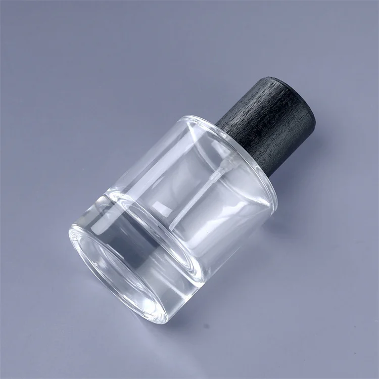 cheap magnetic lids 30ml 33ml 35ml cylinder glass perfume packaging bottle high gloss black with magnet cap india