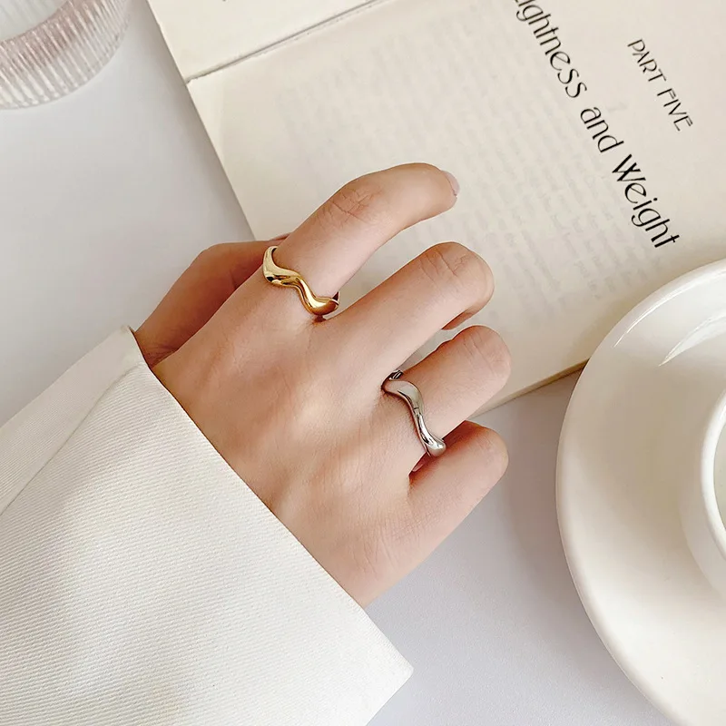 Stainless Steel Ring In 18-Karat Gold Plated With A Minimalist Irregular Fluid Line