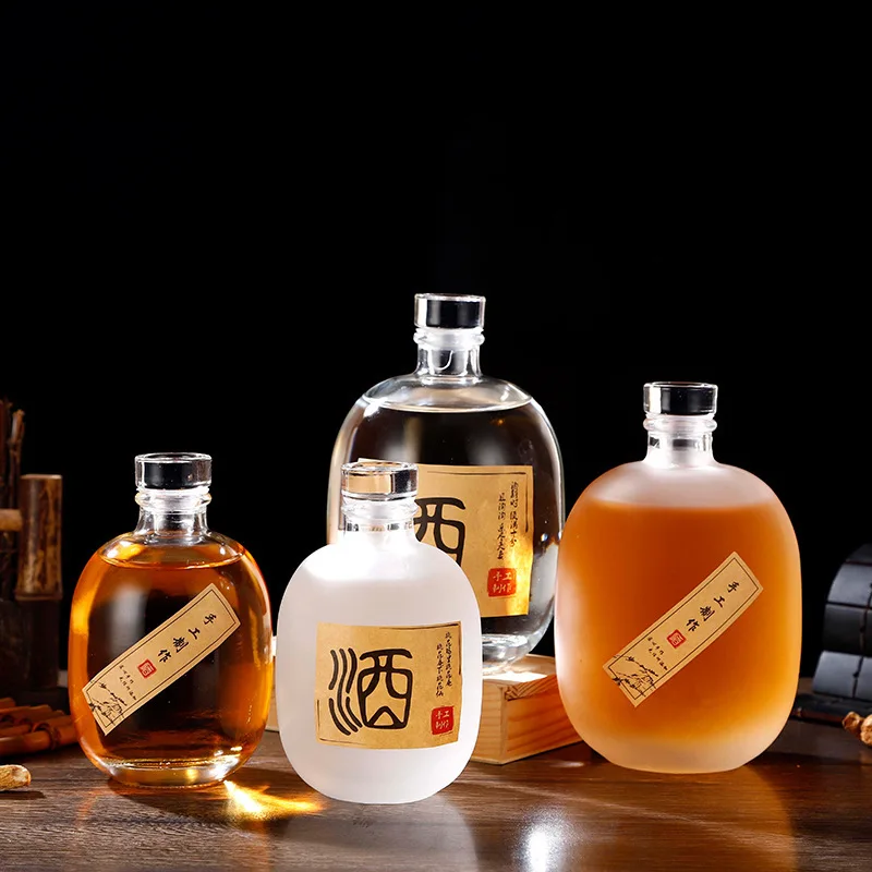 wholesale 250ml 500ml Cylinder Round Vodka Spirit Gin Rum Glass Liquor Bottle Juice Beverage Liquor Packaging Bottle With Cork