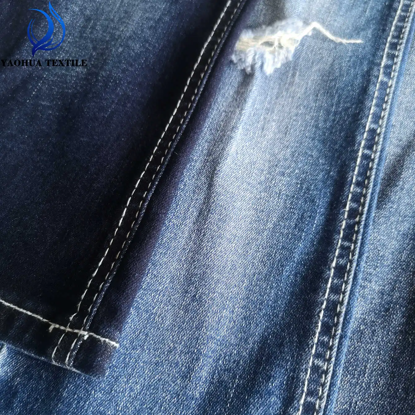 2549 Soft OE Foshan denim manufacturer raw material bull woven twill high stretch denim fabric for shiny jeans