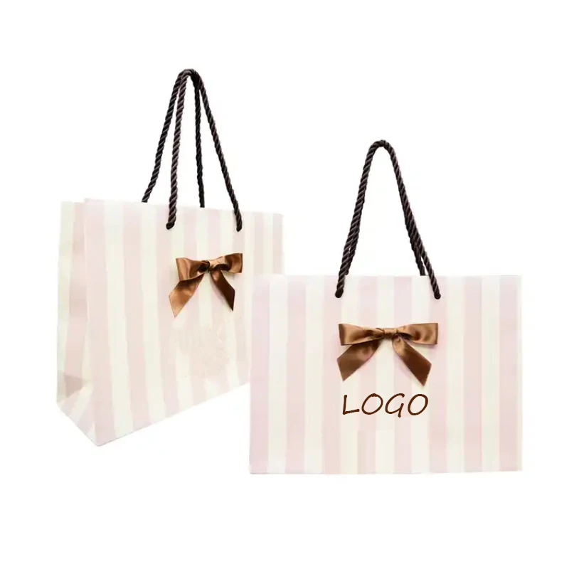Factory wholesale custom printed brand logo bow tie design promotion luxury clothing gift shopping paper bag with handle