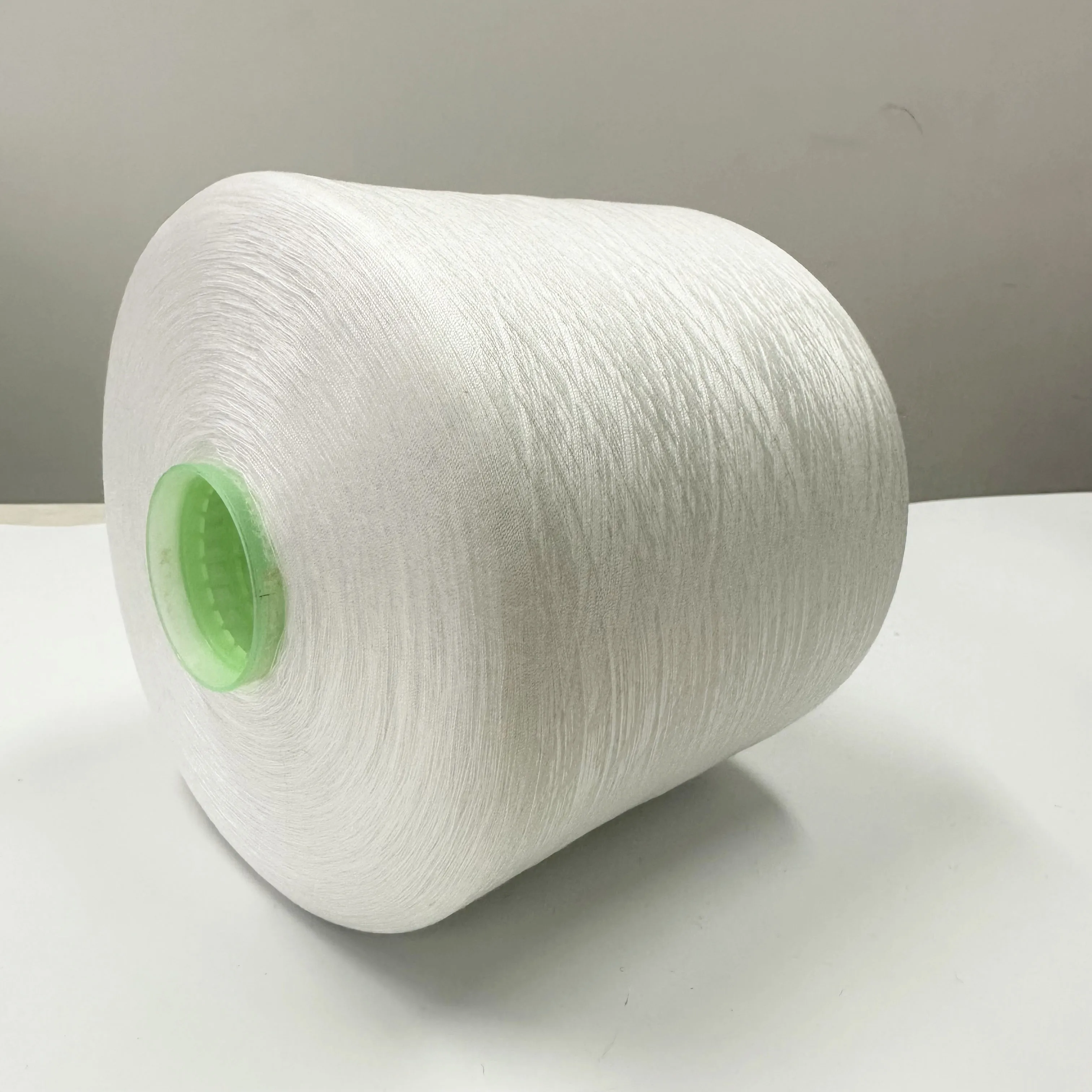 100% recycled polyester yarn raw white corespun durable sewing thread for denim