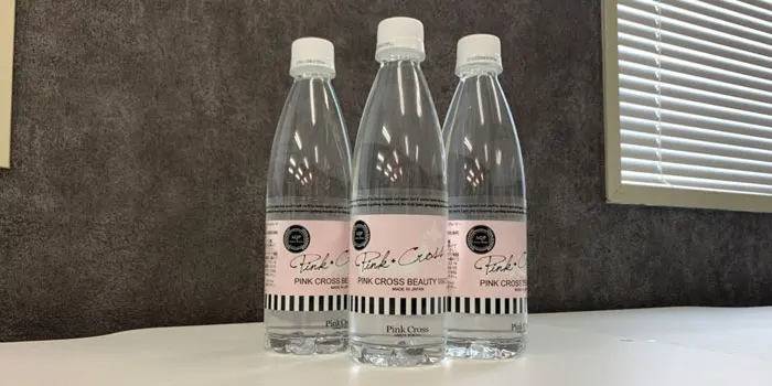 Pink Cloth Domestic Bottled Silicon Natural Beauty Mineral Water