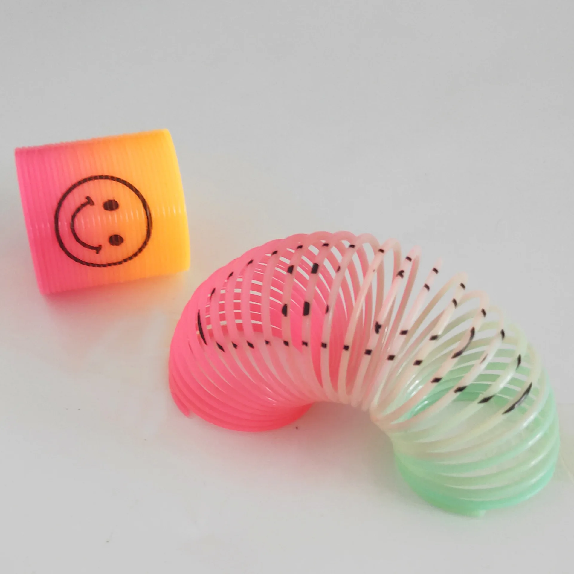 Small Plastic Rainbow Smiling Face Spring Coil Toys Magic Spring classic Educational Gift For Kids