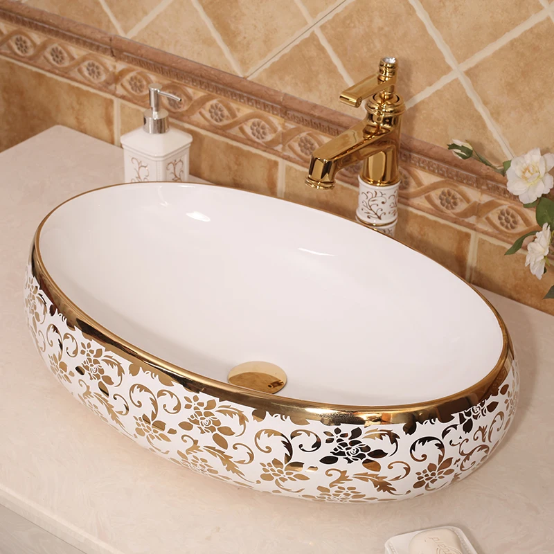 Gilded Elegance Oval Shaped Basin with Intricate Gold Designs for a Luxurious Bathroom ceramic art wash basin counter top sinks
