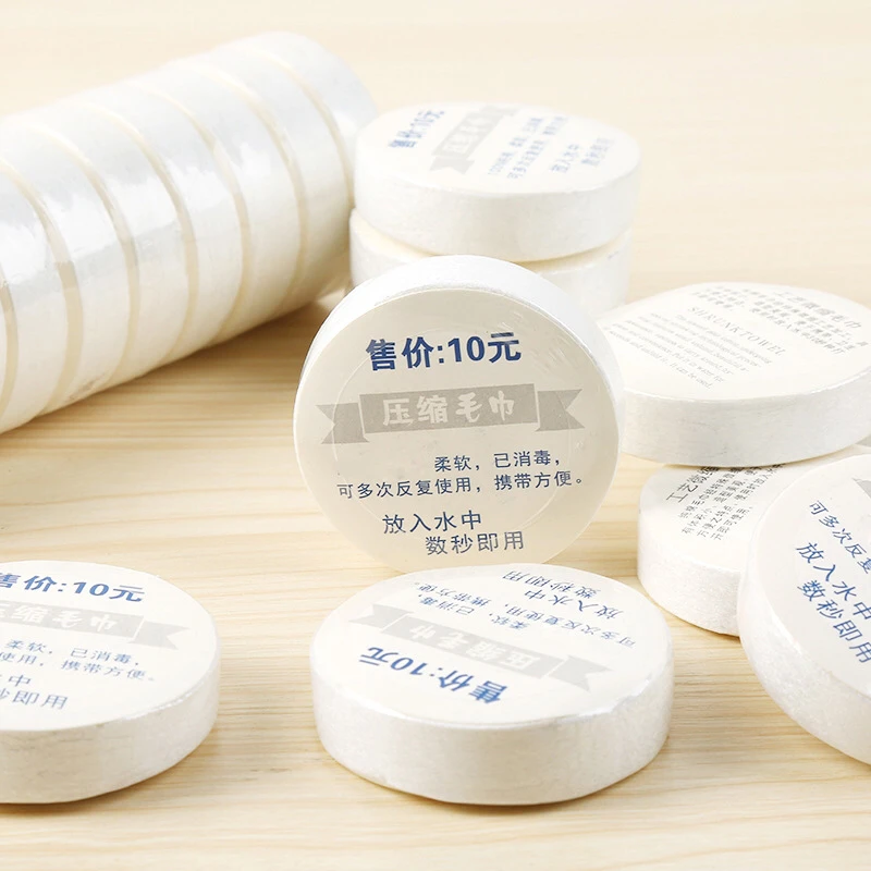 Wholesale Chinese factory compressed disposable hotel travel small towel