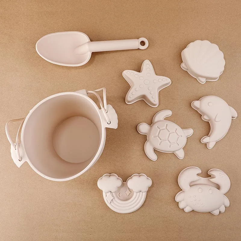 Best Selling Children Summer Outdoor BPA Free Food Grade Silicone Beige White Shovel Bucket Baby Beach Sand Toys Set for Kids