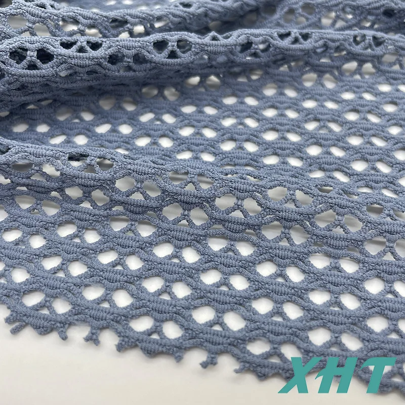 Hot selling color dyeable  hollowed-out eyelets fabric for  swimwear