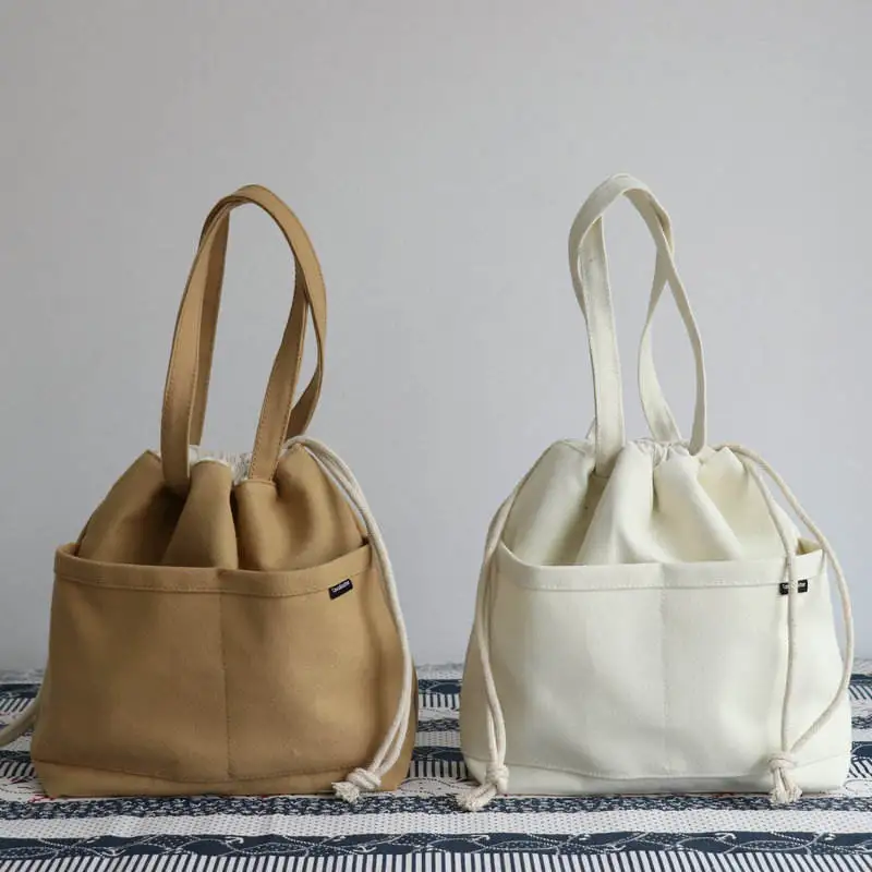 New Style INS Fashionable Simple Cotton Bento Lunch Bag Drawstring Bucket Canvas Tote Bags with Custom Printed Logo