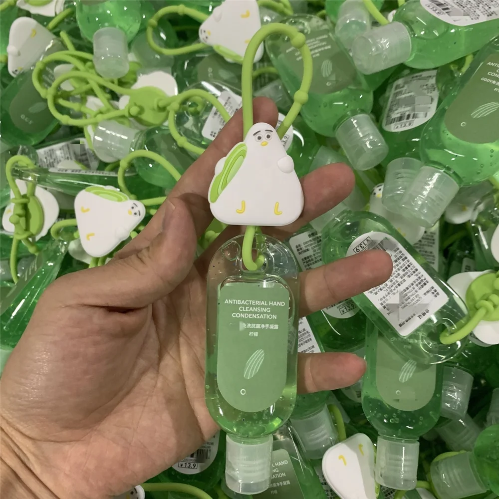Portable Hand Sanitizer Gel Hand Cleansing Gel with Customized Fruit Cartoon Silicone Clip Hook Custom Brand 18 * 4 *3cm Sanoi