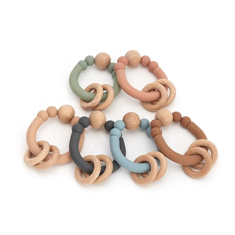 New Design Sensory Baby Teething Toys Rattle Soft Bpa Free Wood Baby Teether Ring Silicone Teether