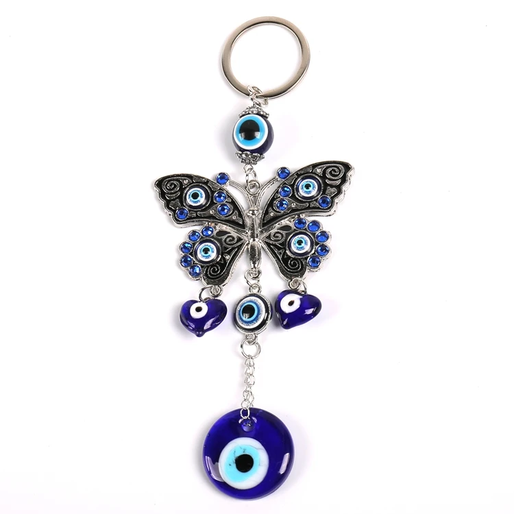 Long Linked Butterfly with Blue stones ,Heart shape Charms on Key Chain and Glass Evil Eye Pendant Decor