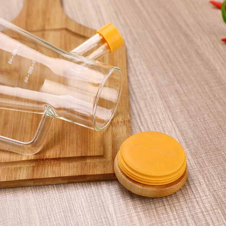 Eco-friendly kitchen glass cooking olive oil bottle with bamboo lid and handle