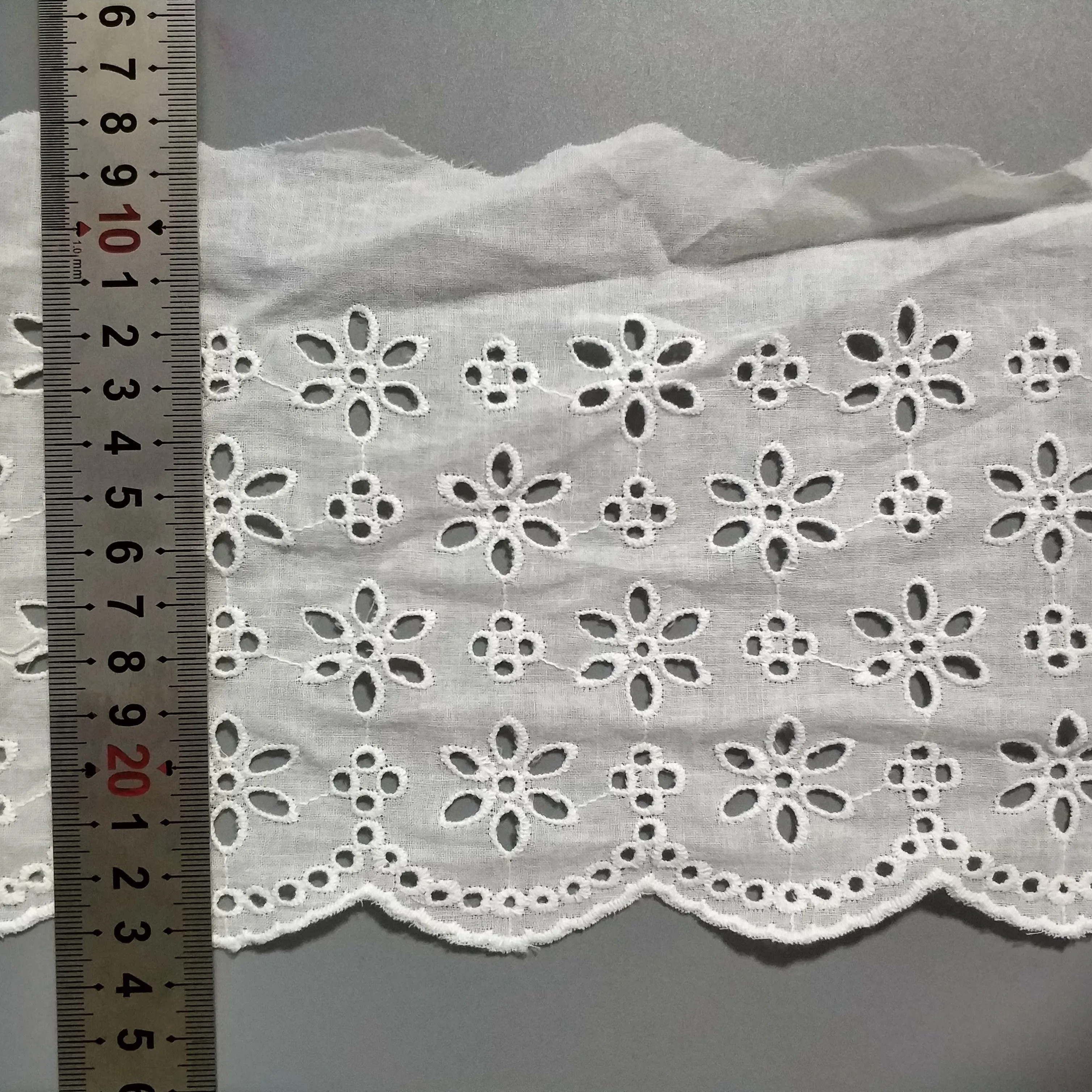 100% cotton broderie anglaise lace with white fabric base