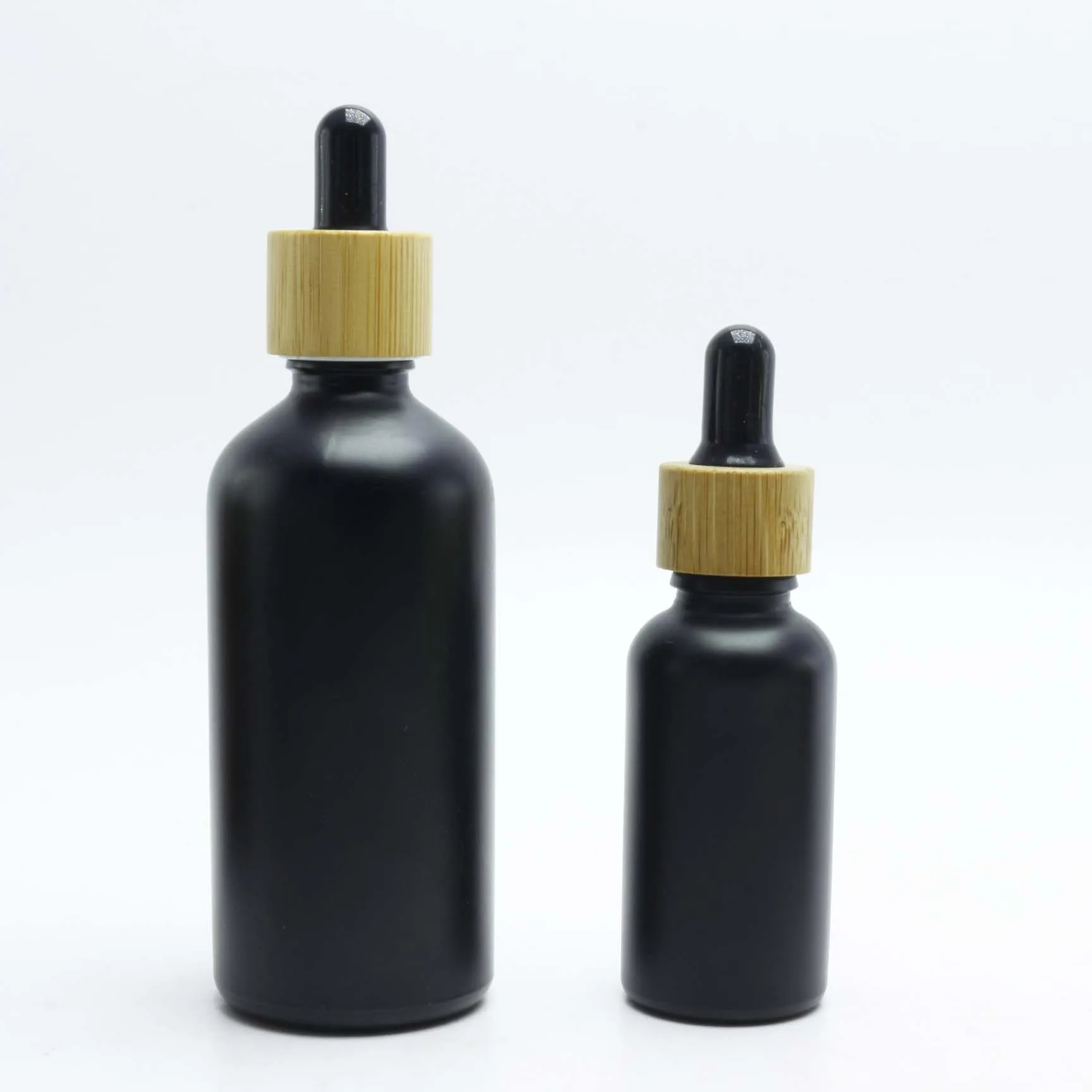 Best selling 30ml black frosted cosmetic bottle essential oil bottle with measurement pipette and paper tube packaging GB-AN35
