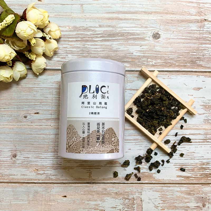 Подарочная упаковка с зелеными листьями зеленого чая из Тайваня золотистого улуна в жемчужно-белой канистре