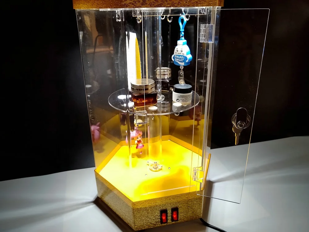 Led illuminated acrylic light display case rotating with lock and door