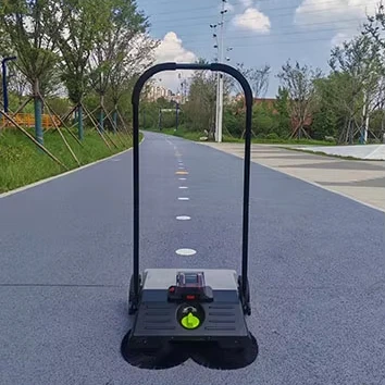 Battery sweeper for large debris removal in parking lots and sidewalks
