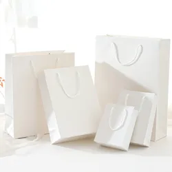 Luxury Gift Packaging Hot Stamping Laser Bright Gold Text Custom Logo Printed Pink Ribbon Shopping Paper Bag for Cosmetic