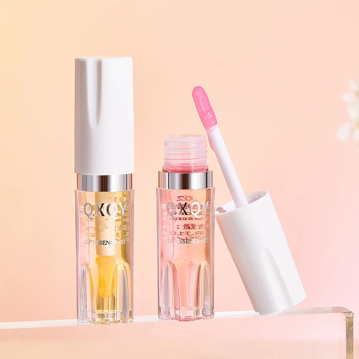 QXQY OEM ODM Wholesale Base Lip Gloss Moisturizing And Glossy Lip Care Layering Light Color Changing Lip Essence Oil