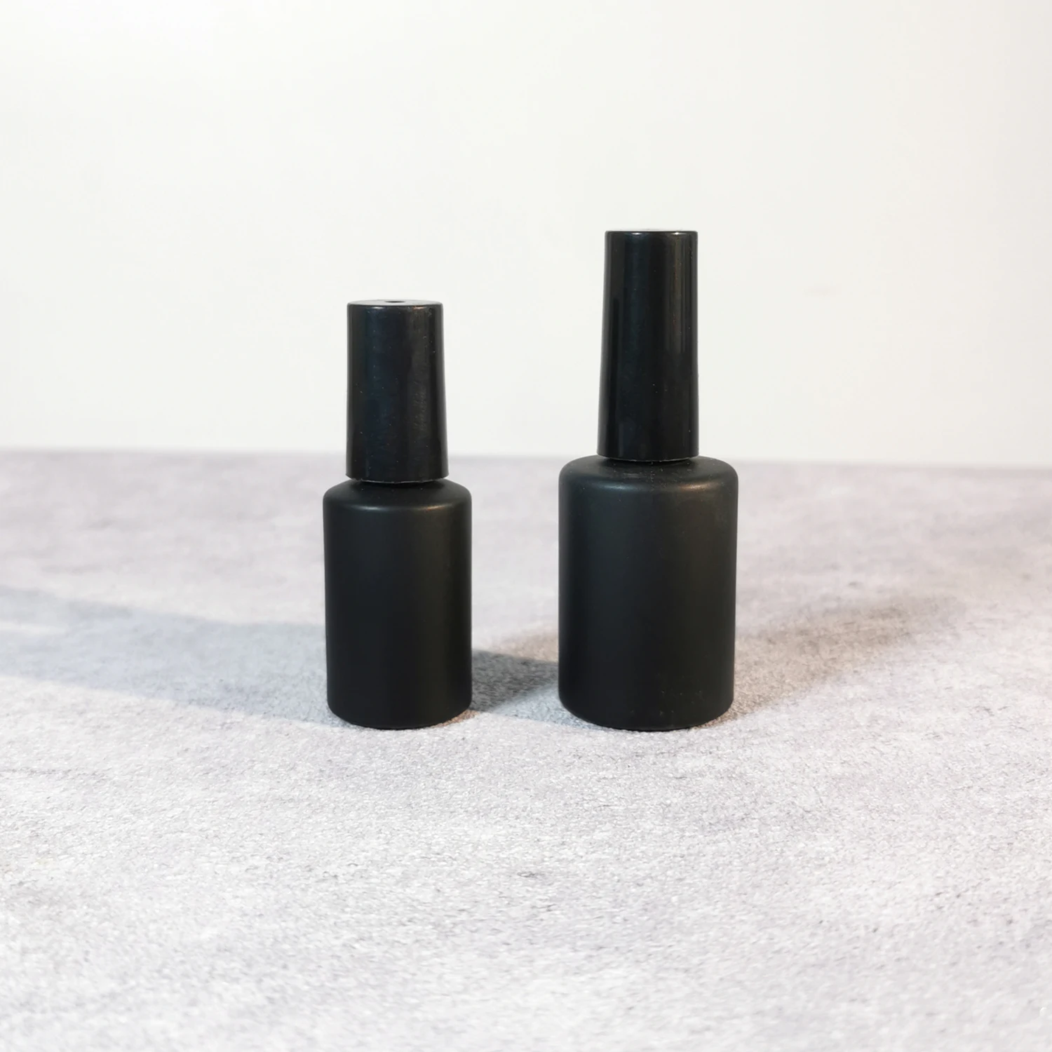 Hot selling 5ml 10ml cylinder frosted matte black empty glass uv gel nail polish bottle with brush and cap
