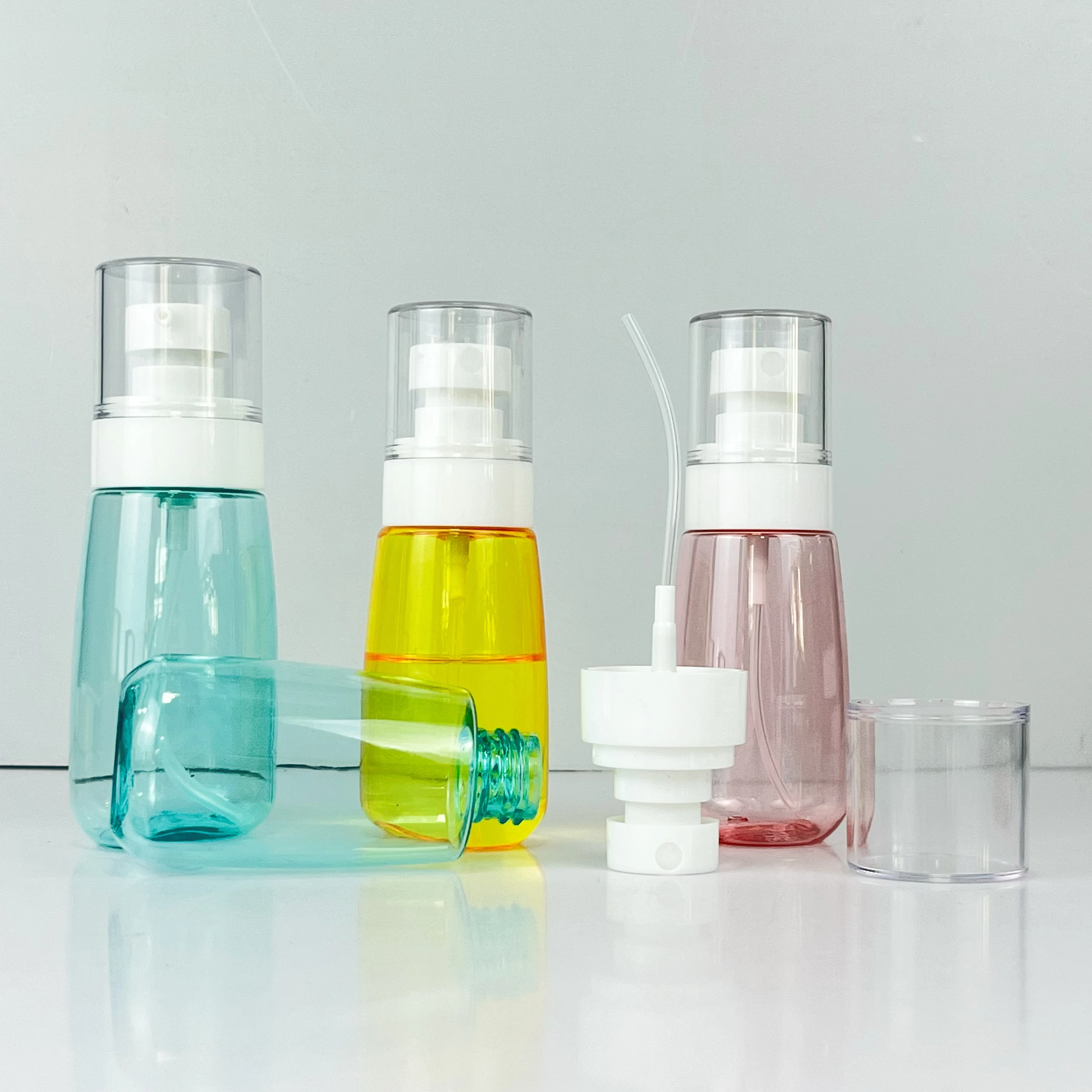 white blue PETG plastic cosmetic packaging spray bottle