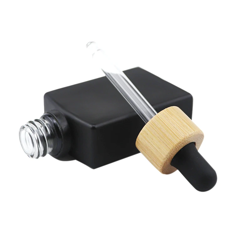 Popular empty clear flat square rectangle 1oz 30 ml Cosmetic  Glass Dropper oil Serum Bottle 30ml with Bamboo Cap