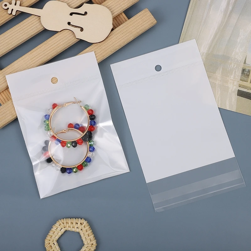 Оптовая продажа индивидуальные прозрачные пластиковые ювелирные изделия серьги Висячие отверстия самоклеящиеся пакеты с отверстием для