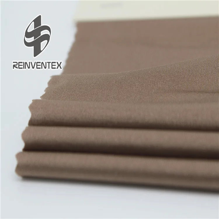 
1754 Shaoxing wholesale knit smooth single jersey shiny polyester spandex stock lot fabric for tshirt vest 