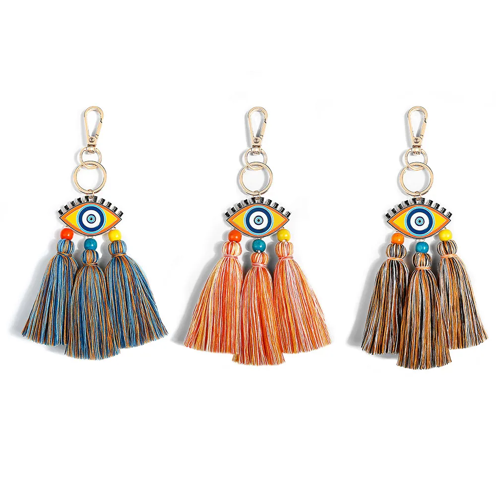  New design fashion personalized enamel devil eye 100% cotton tassel macrame keychain bag charm for