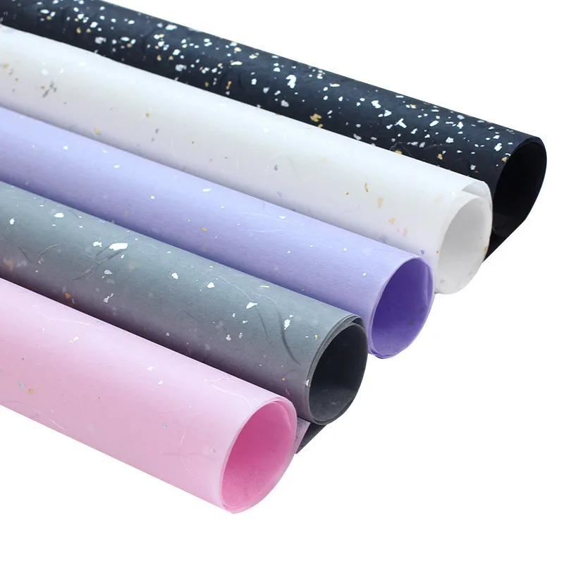 
Gift wrapping paper Korean waterproof bouquet gift wrapping material Bright Cloud dragon wholesale Fantasy gold and silver paper 