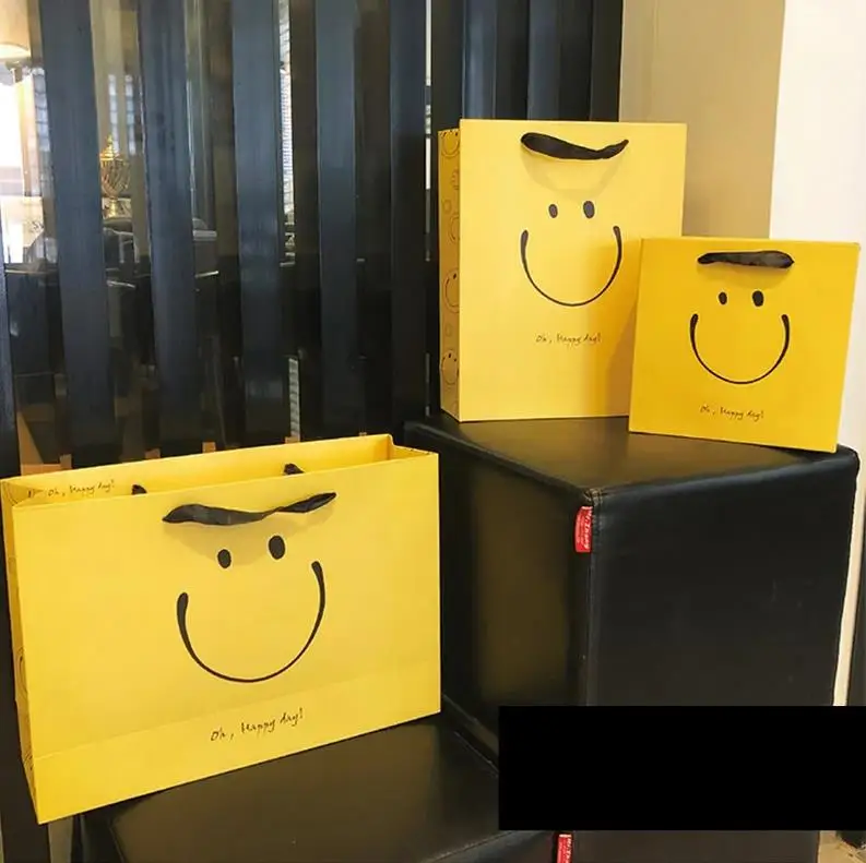 Cute Paper Bags With Your Own Logo Yellow Smiling Face Luxury Shopping Gift Paper Bags For Shoe Clothing Packaging