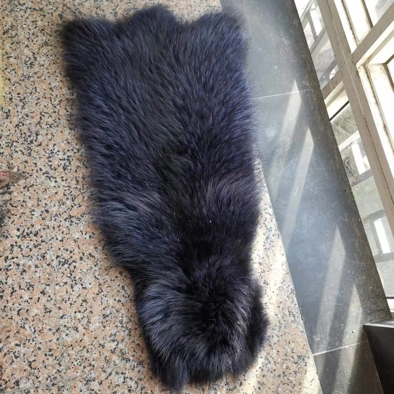 Natural raccoon fur pelts