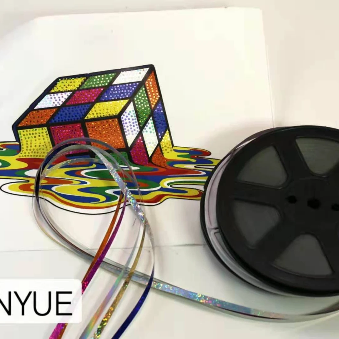 Rubiks cube design made of hotfix spangle by row of figure machine