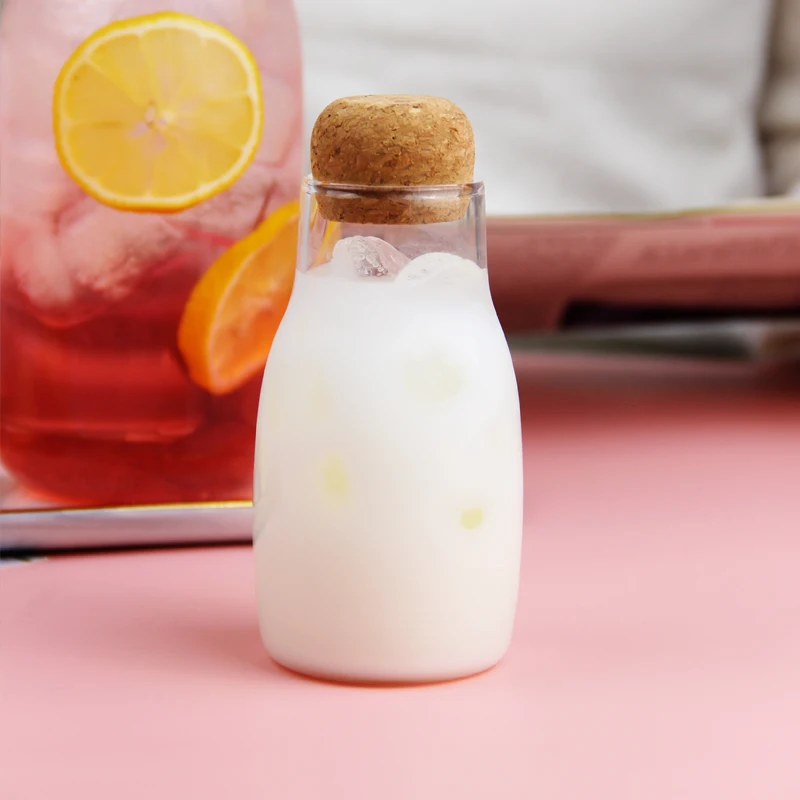 Kitchen Glass Storage jar with cork lid glass water bottle manufacture OEM  jars with unique feeder shape for honey