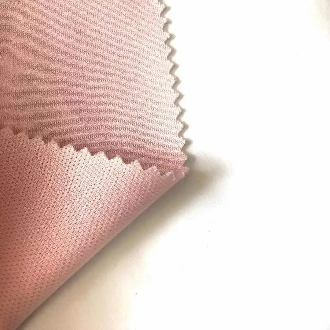 
China Cheap Price 100% Polyester Pink Dyed Bird Eye Knitting Mesh Fabric for Sportwear Clothing 