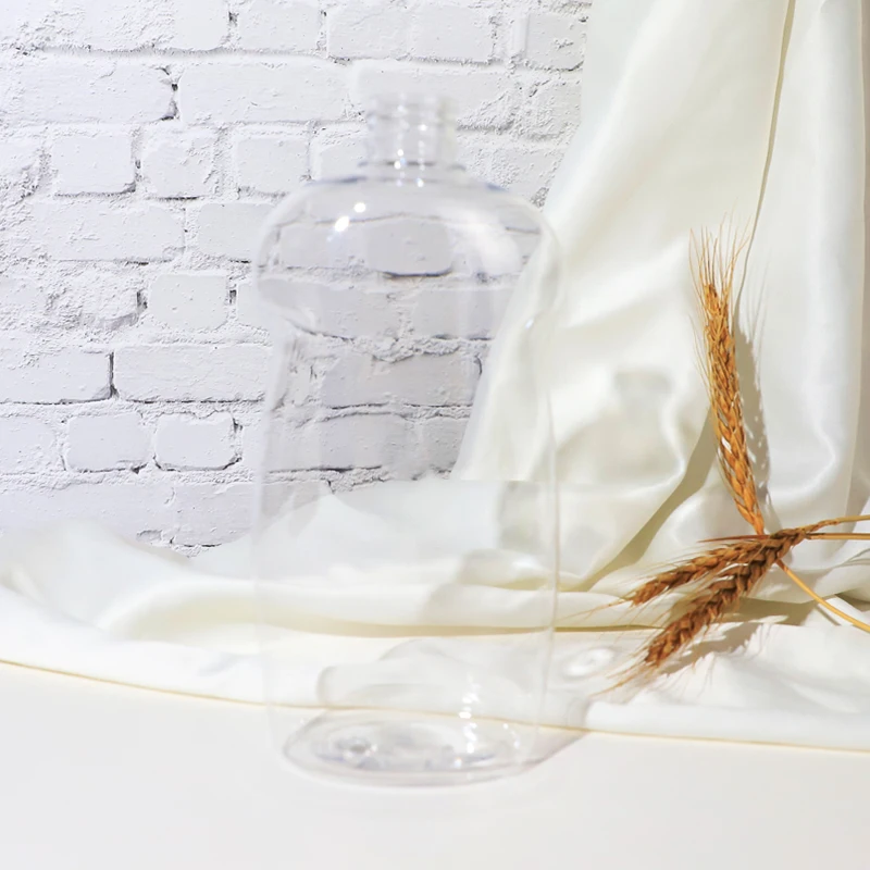 
Factory Good Quality In Stock Personal Care Lotion Pump Sprayer Clear 600ml PET Baby Oil Plastic Bottle in Bulk 