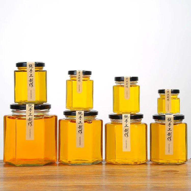  Wholesale Custom Size Logo & Style Hexagonal Glass Honey Jar With