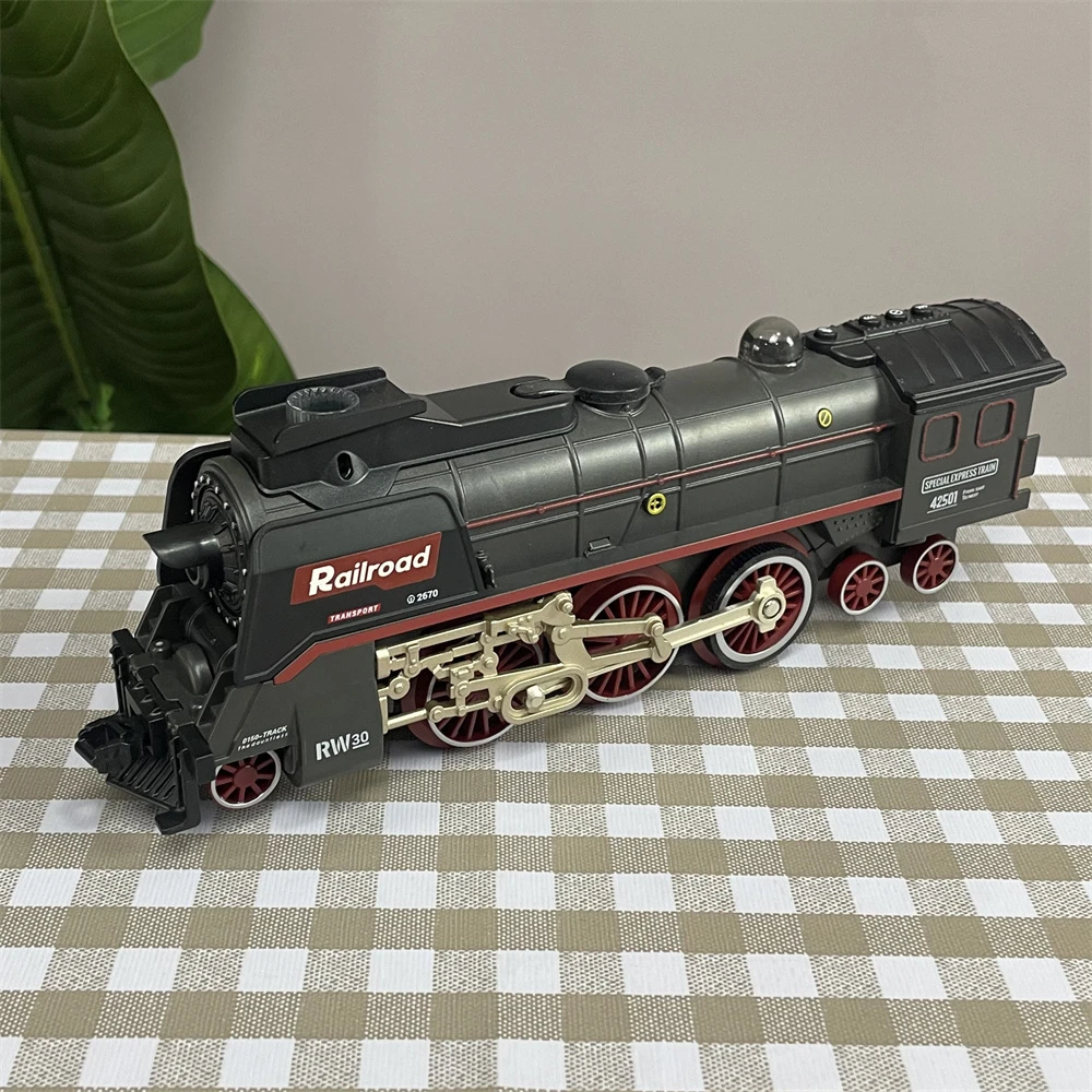 Hot Selling DIY Assembly Plastic Steam Slot Railway Vehicle Locomotive Model Electric Music Light Track Smoke Train Toy Set