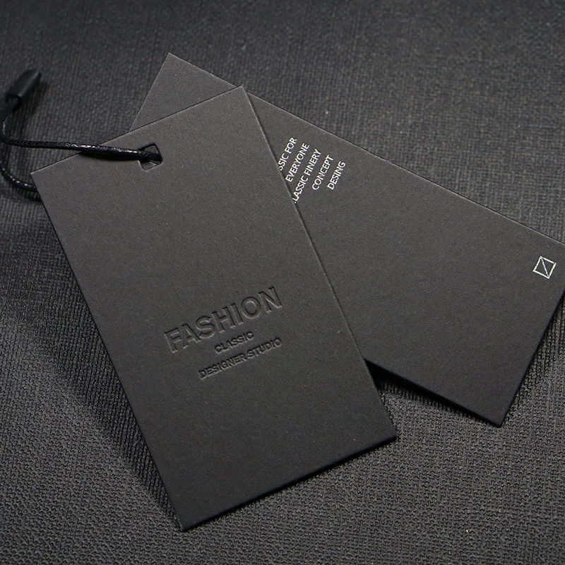 Custom thick black paper uv printing swing hang tags brand name luxury metal eyelet clothing garment hang tag with safety pin