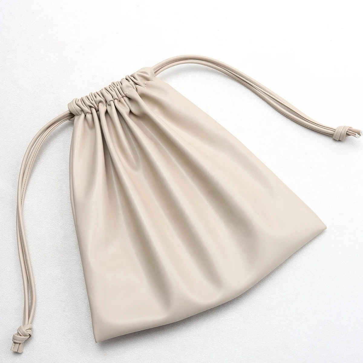 New Product Waterproof Wholesale Drawstring PU Leather Carry Pouch For Cosmetics Packing Leather Pouch Bags
