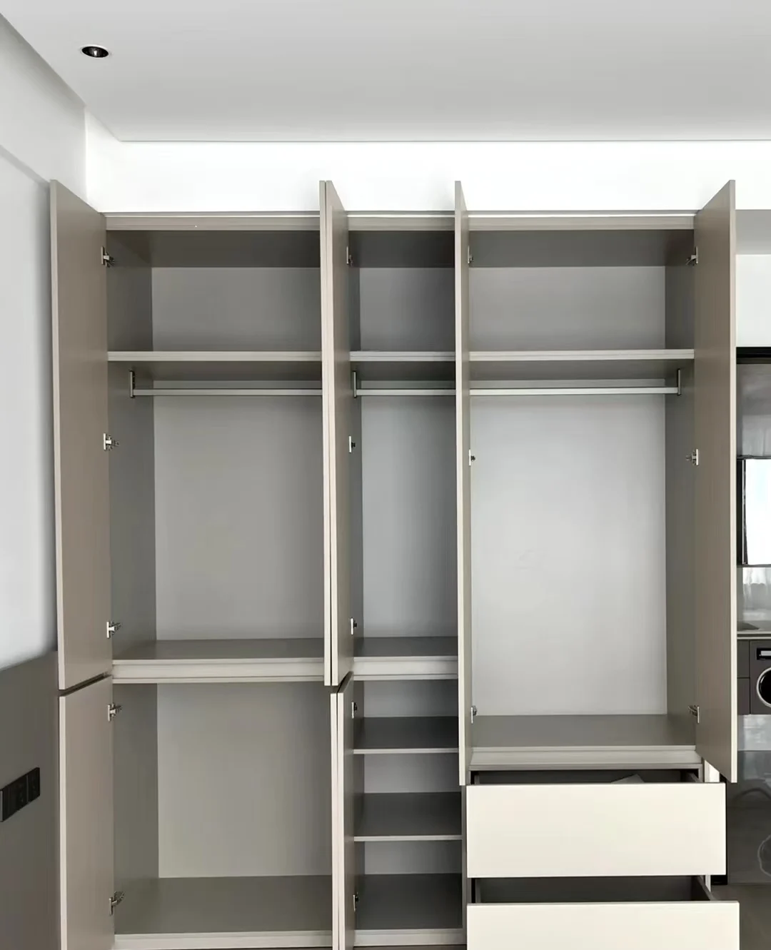 Modern Style Wardrobe From a Production Manufacturer Featuring Drawers With Handle-less Design