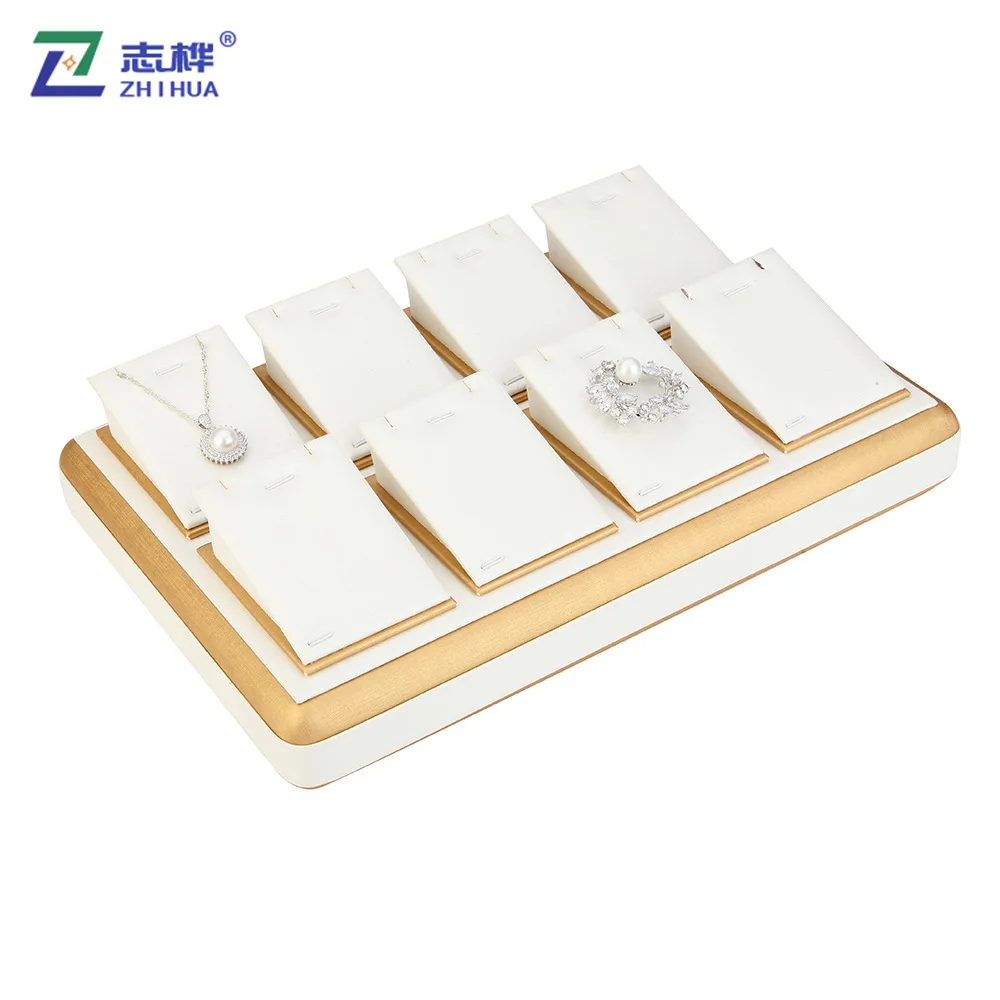 Custom White PU Leather Pendent Necklace Earrings Display Stand Luxury Round Corner Jewelry Display Tray