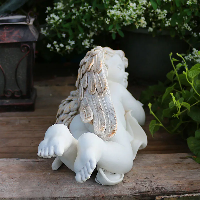 
Outdoor garden angel sculpture resin Cupid angel sculpture 