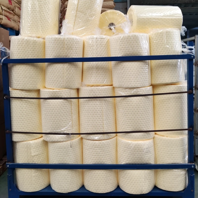 Medium weight dimpled chemical hazardous spill absorbent rolls